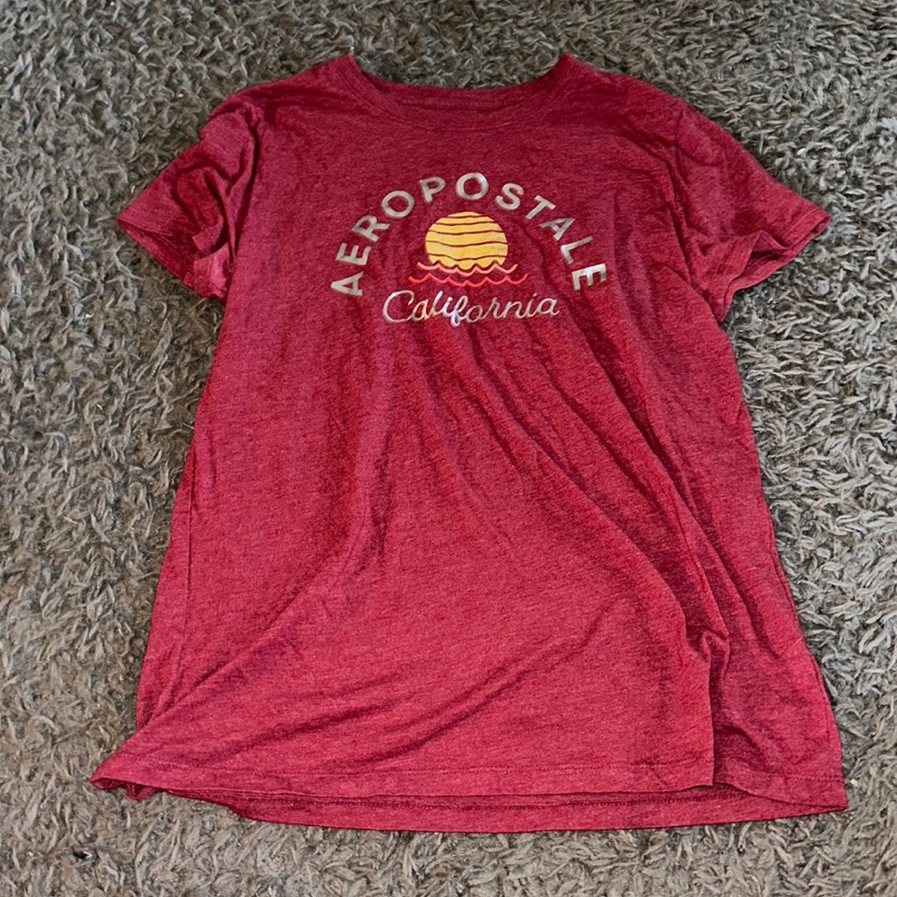 Red areopostle tee shirt. Size XL. Never been worn.